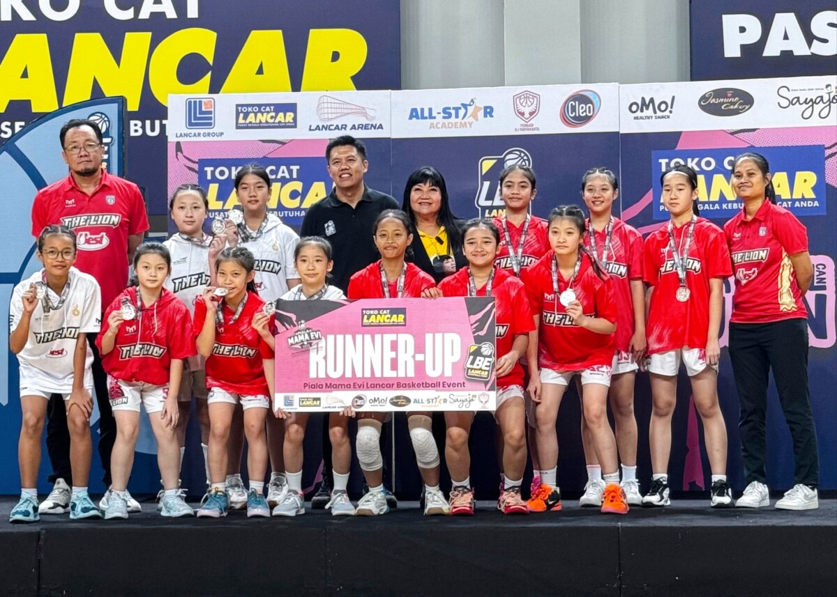 Mama Evi ketika bersama para juara 