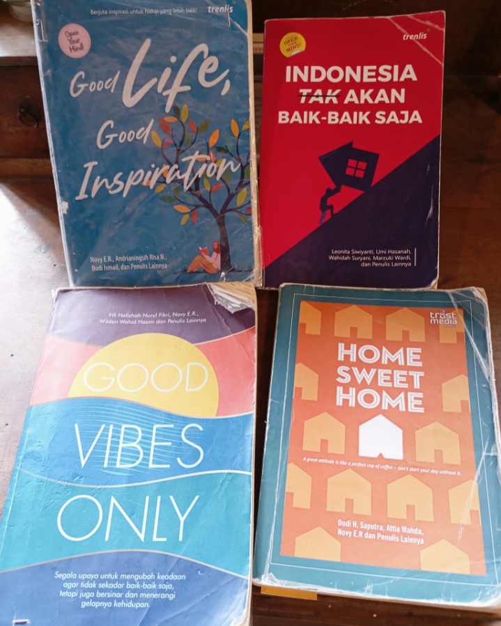 Koleksi buku Novy E.R. termasuk 'Good Vibes Only' dan 'Tercatat di Lauh Mahfuzh', tentang spiritualitas dan energi positif