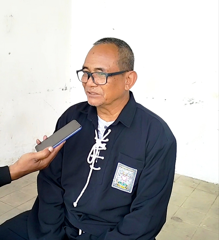 Ketua PSHT Cabang Batu, KangMas Sutrisno ketika memberikan keteranganya terkait latihan gabungan. 