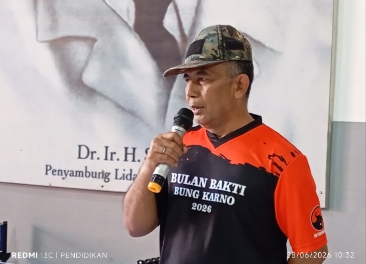 Ketua pelaksana ketika memberikan laporannya. 