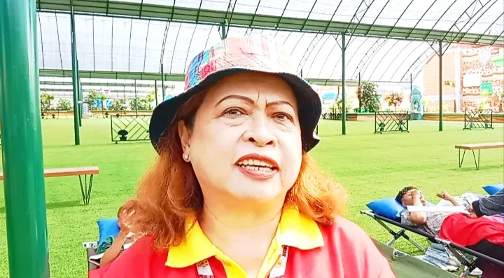 Enny Yulistiyorini dari PDDI Kabupaten Malang ketika di lokasi.